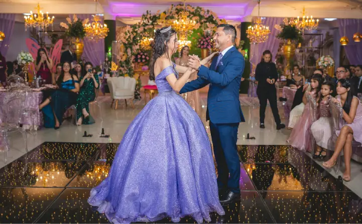 Father and daughter sharing a sweet dance during Quinceañera.